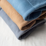 Close-up of the soft naturally coloured EverNest bundle fabrics